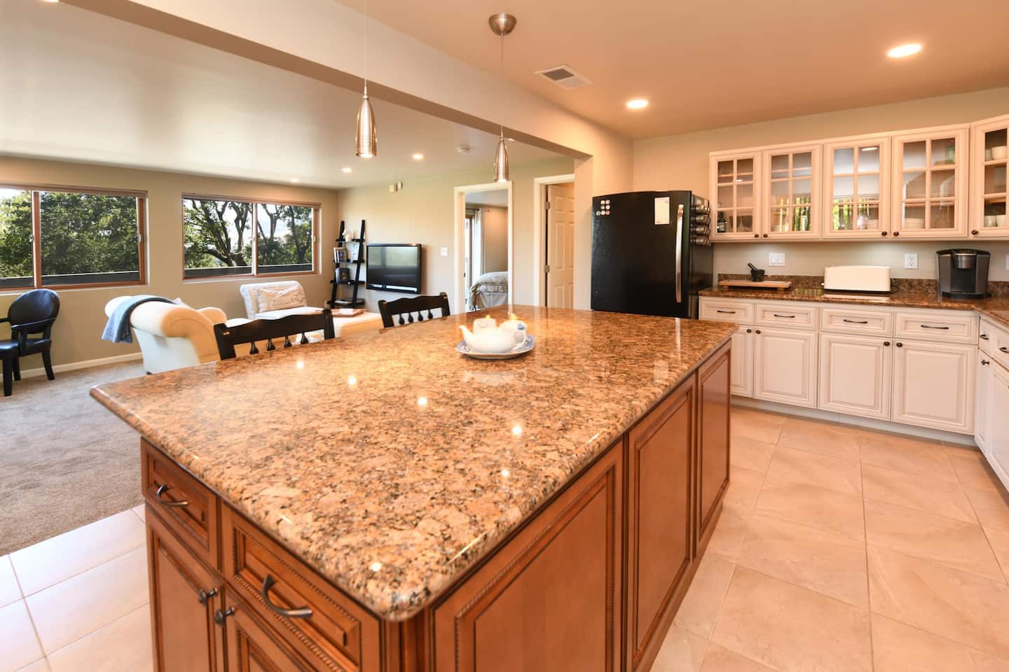 Full kitchen with granite island
