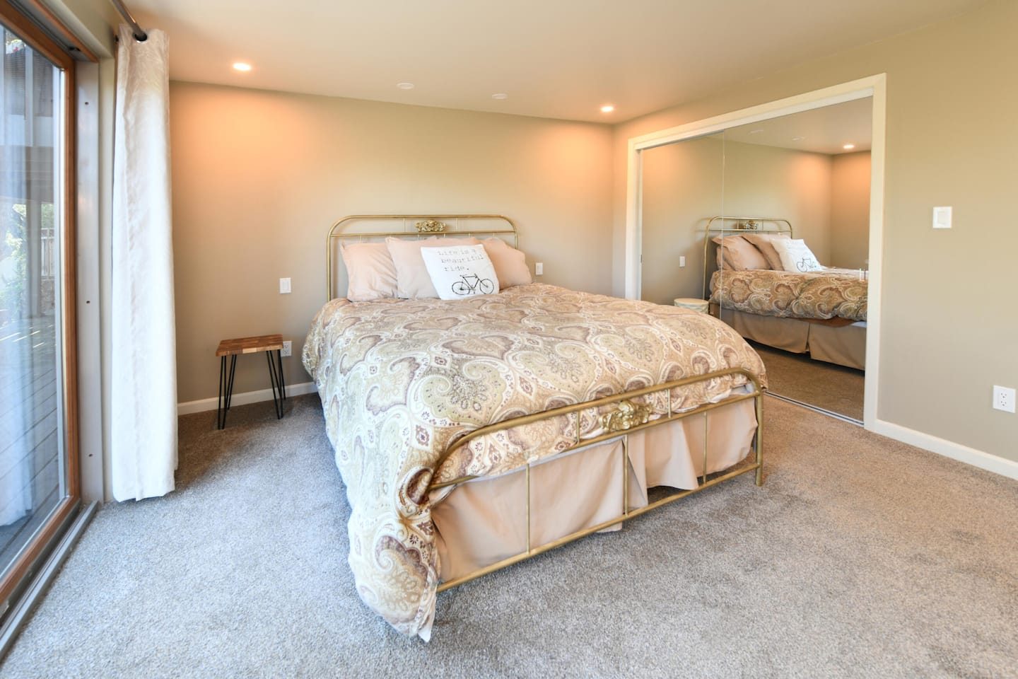 Bedroom with vintage wrought iron bed