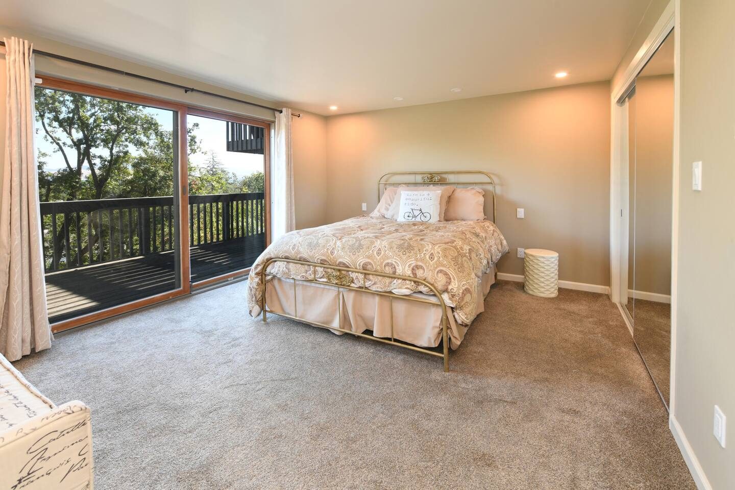 Bedroom with sliding doors to the deck